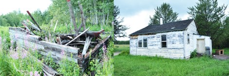 Ruins of a log built structure beside one of the earlier built homes