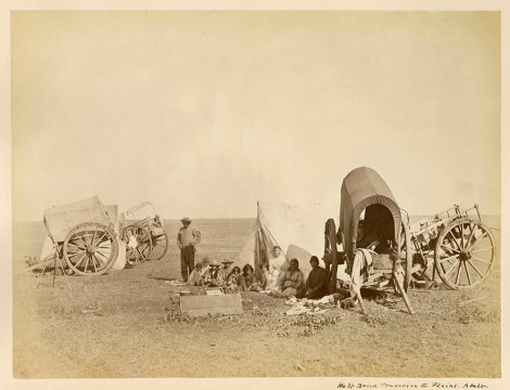 Camp scene of Métis people with carts on the prairie, 1872-1873. (Image: Library and Archives Canada / C-081787)